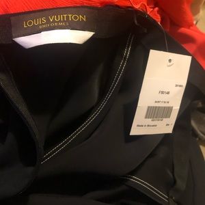 Knee length skirt, white double stitch.